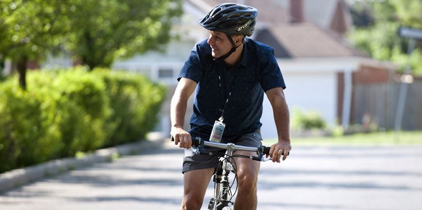Pictured: Dr. Claude Alain biking towards Baycrest Health Sciences, Toronto.com